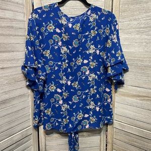 Women’s Top with ruffled sleeves.